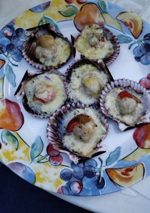 Una foto de Ostiones a la Parmesana en su Concha