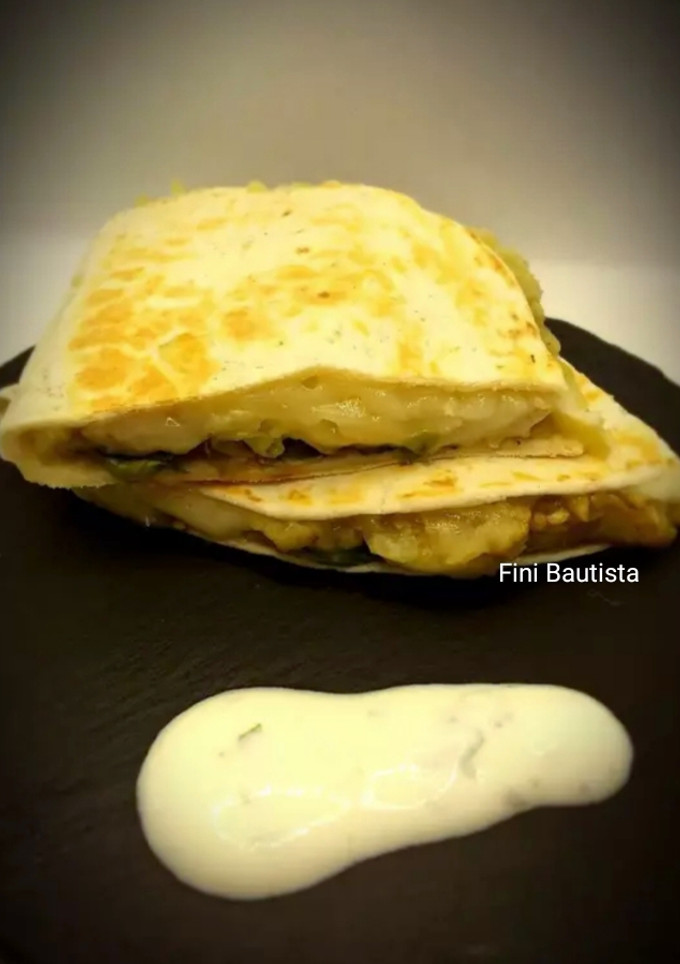 Una foto de Quesadilla de berenjena