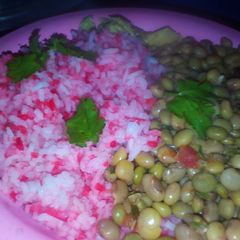 A picture of Rice and green peas.