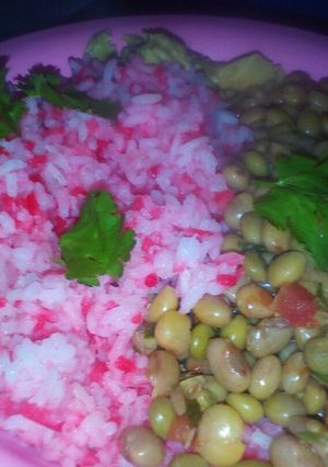 A picture of Rice and green peas.