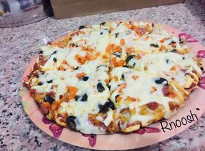 صورة لوصفة بيتزا المقلاة بالعجينة السائلة 🍕