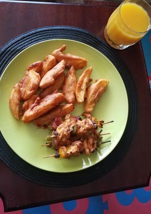 A picture of Chicken mshikaki and potatoes.