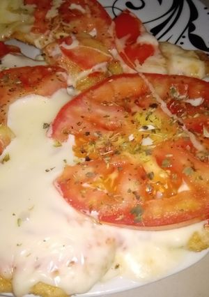 Una foto de Milanesas de Pollo a la Napolitana
