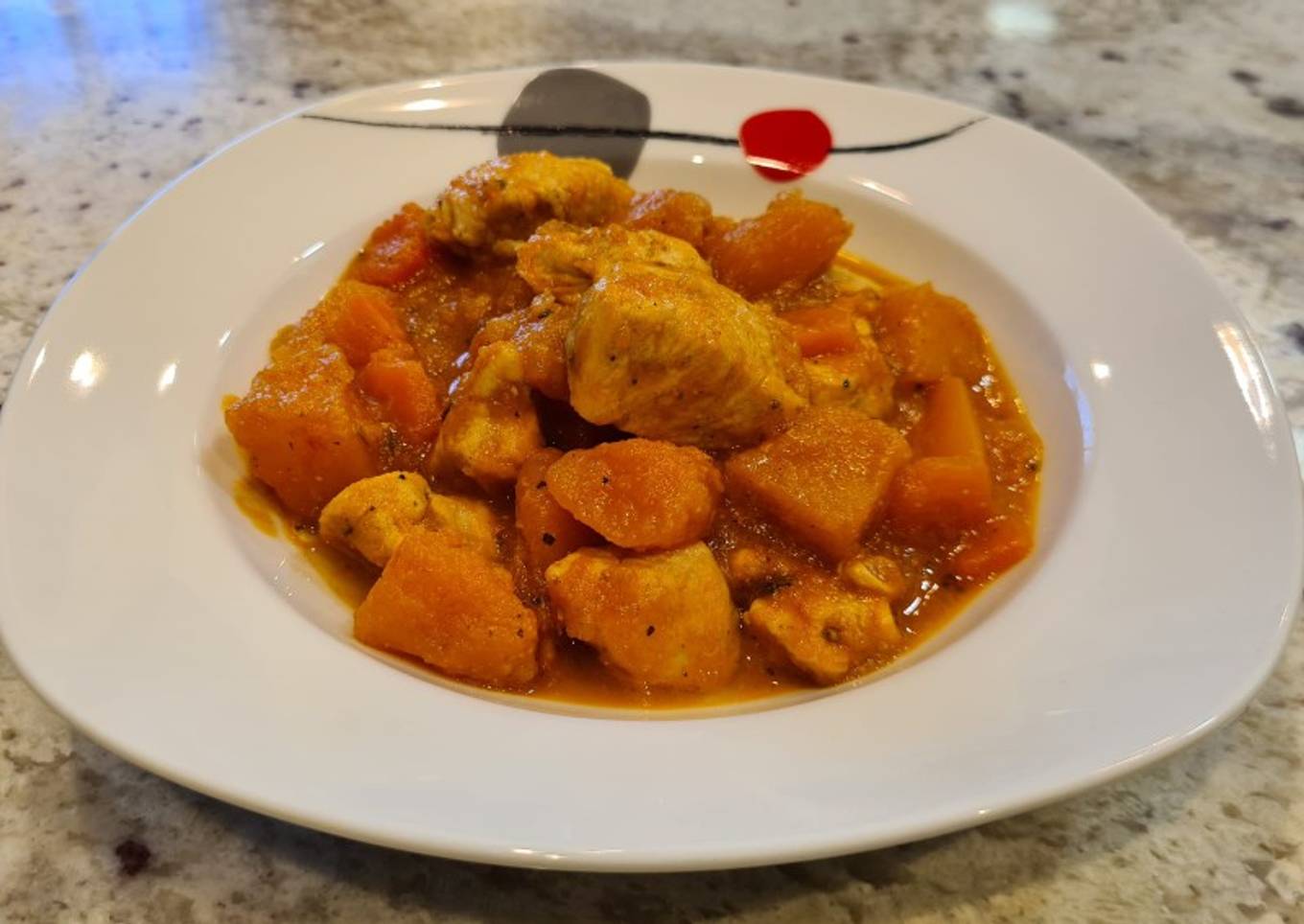 Dados de pollo con calabaza