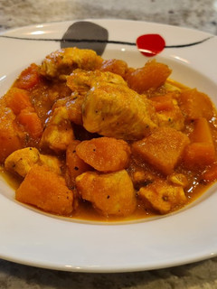 Una foto de Dados de pollo con calabaza