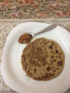 A picture of Yogurt aaloo stuffed paratha.