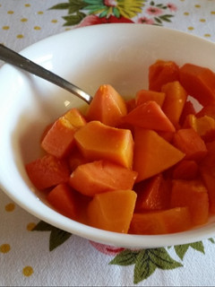 Una foto de Papaya y naranja