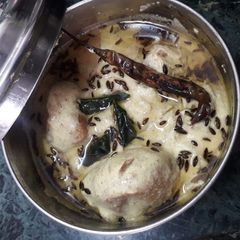 A picture of Besan wale nimbu achaar or dahi ki curry.
