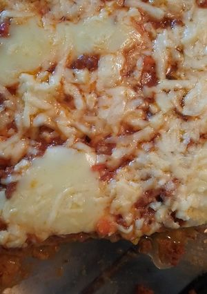 Una foto de Polenta con boloñesa