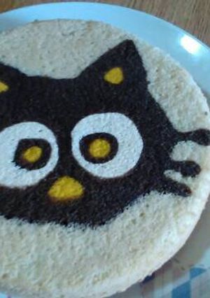 Una foto de Bizcochuelo con dibujo impreso de Gato
