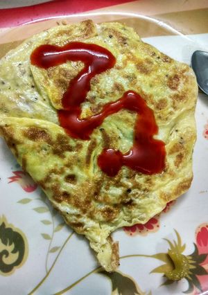 A picture of Egg wrapped fried rice | omurice rice/Omelette rice.