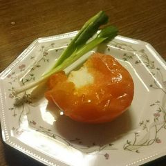 A picture of Microwaved Egg in Tomato .