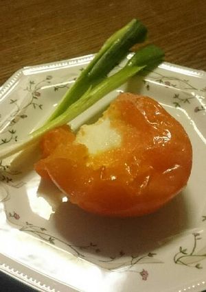 A picture of Microwaved Egg in Tomato .