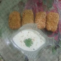 Potato nuggets (coated with corn flakes) crumbs A picture of Potato nuggets (coated with corn flakes) crumbs.