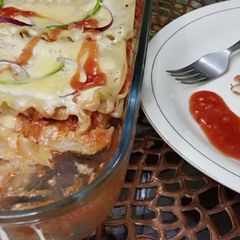 A picture of Smokey chicken tikka lasagna.
