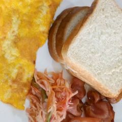 A picture of Bacon and Eggs breakfast.