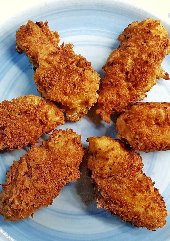 Una foto de Alitas de pollo fritas en tempura y panko