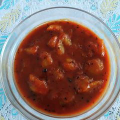 A picture of Sweet and Spicy Raw Mango Curry with Jaggery.