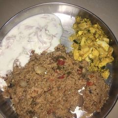 A picture of Tomato rice with egg.