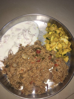 A picture of Tomato rice with egg.