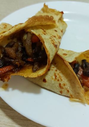 Una foto de Wraps de avena dulce con salteado de verduras y queso