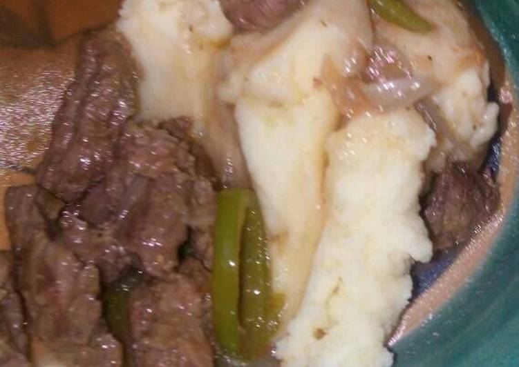 Cream of mashed potato served with beef stew