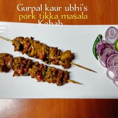A picture of Pork Tikka masala kebab 🫑🍅🧅🌶️.