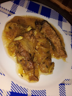 Una foto de Costillas al vino blanco