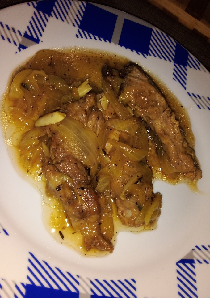 Una foto de Costillas al vino blanco