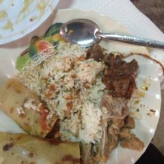 A picture of Rice and beef.