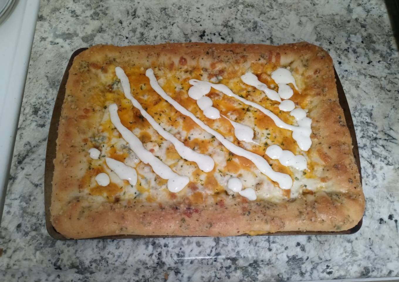 Homemade stuffed crust buffalo chicken pizza