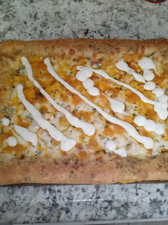 A picture of Homemade stuffed crust buffalo chicken pizza.