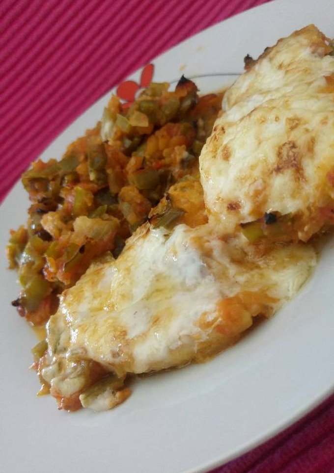 Una foto de Merluza al horno con mayonesa y guarnición de la mía mamma