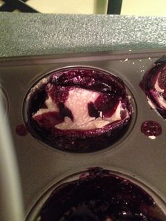 A picture of Mini blueberry pies.