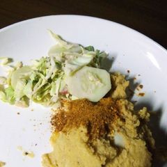 A picture of Bean pudding & vegetable salad.