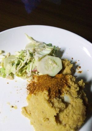 A picture of Bean pudding & vegetable salad.