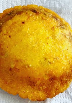 A picture of Arepa de Huevo with Ground Beef.