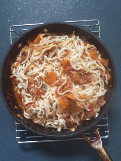 A picture of Tagliolini simple Bolognese.