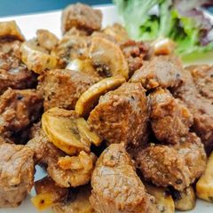 A picture of Black Pepper Steak and Mushroom.