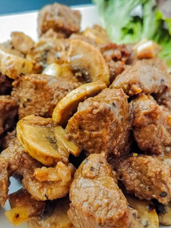 A picture of Black Pepper Steak and Mushroom.