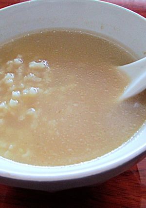 Foto principal de Caldo familiar casero de gallina con arroz