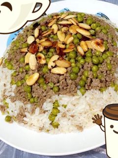 صورة لوصفة ارز ابيض مع لحم مفروم وبسله بالمكسرات 😋