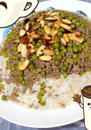 صورة لوصفة ارز ابيض مع لحم مفروم وبسله بالمكسرات 😋