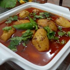 A picture of Arvi chicken ka salan.