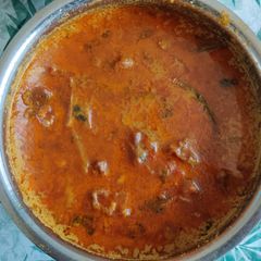 A picture of Mutton kulambu/gravy.