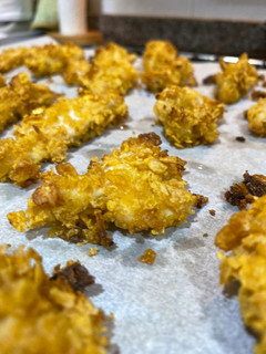 Una foto de Fingers de pollo con cereales Corn Flakes al horno