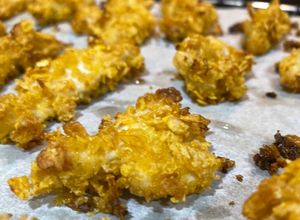 Una foto de Fingers de pollo con cereales Corn Flakes al horno