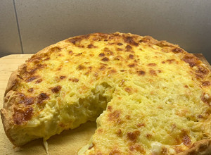 Una foto de Tarta de cebolla y queso