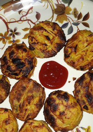 A picture of Vegetable tandoori momos.