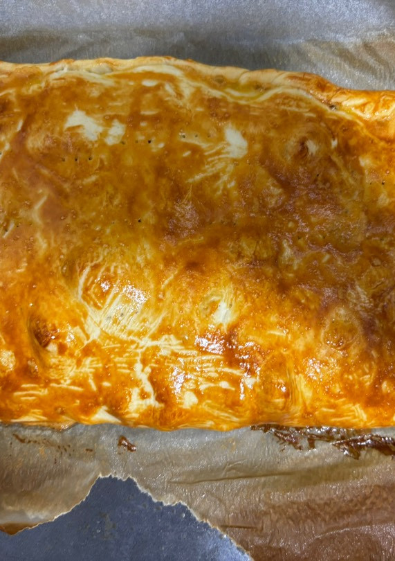 Una foto de Empanada de pollo y Bacon